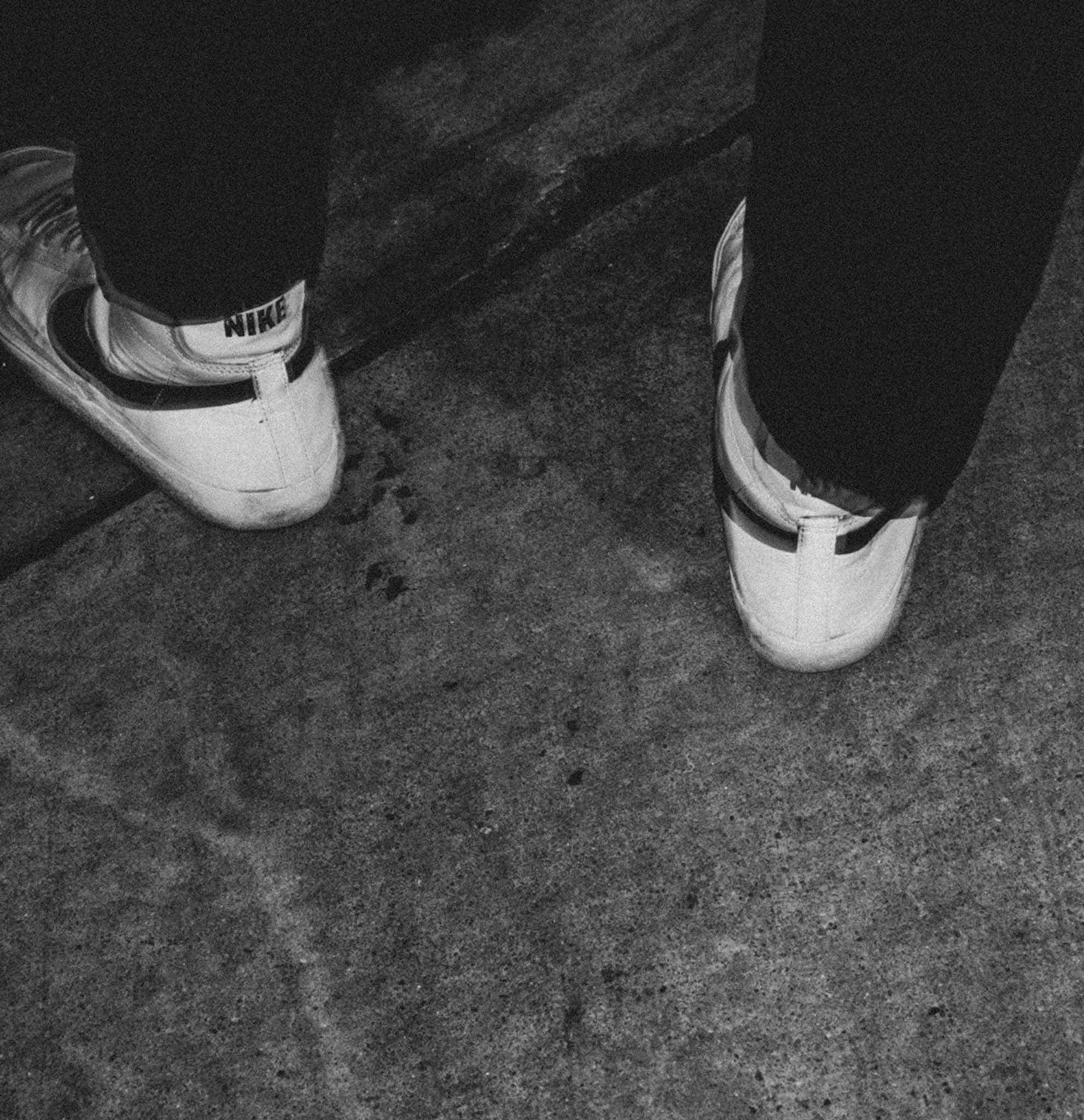 White Nike shoes in black and white